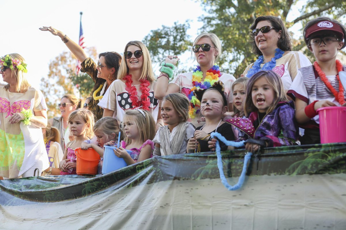 Crowd gathers in Crestline Village for Mystics of Mountain Brook parade